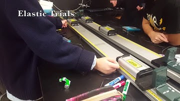 Momentum of Two Spring Carts Lab