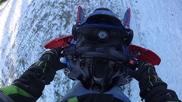 Riding my 2006 polaris switchback 600 H.O around my yard