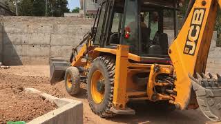 jcb 3dx transporting soil