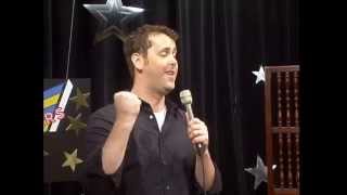 Mike Maxwell performs stand-up comedy.