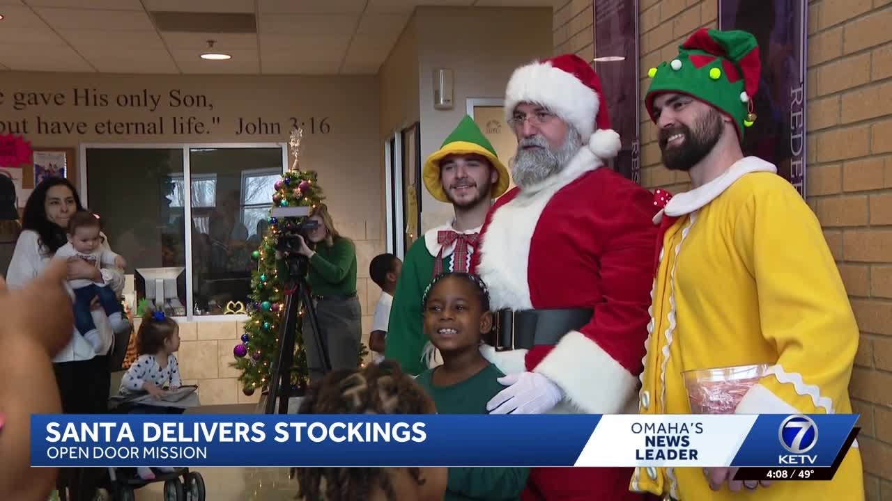Santa Claus makes stop at Open Door Mission on Christmas Eve