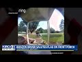 Amazon driver salutes flag on front porch