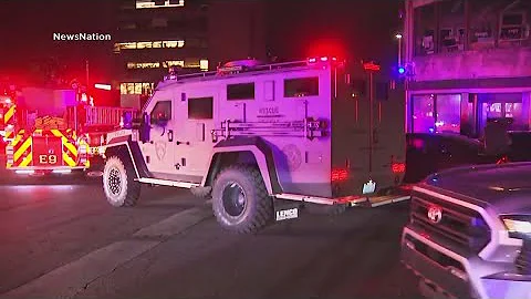 Police have person of interest in custody over Brown University deadly shooting