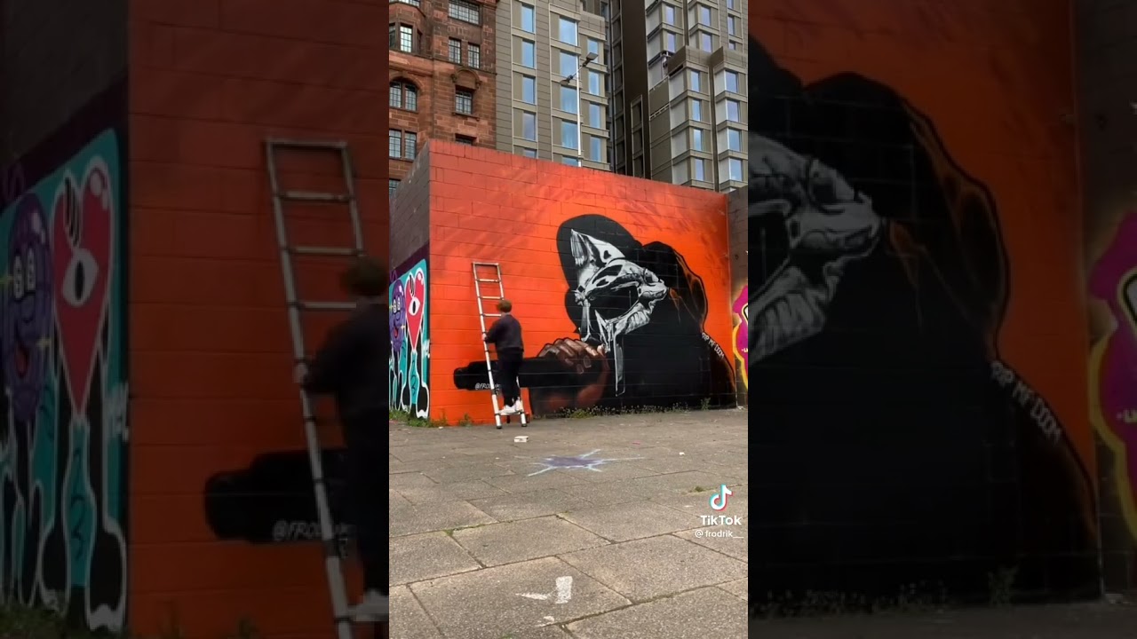Restoring MF DOOM Mural