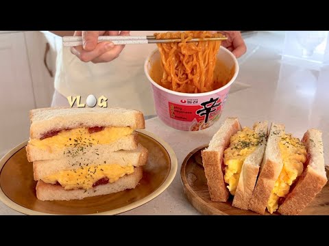 A homebody who's obsessed with rosé, indulging in an egg sandwich and a Spam kimchi rice burger