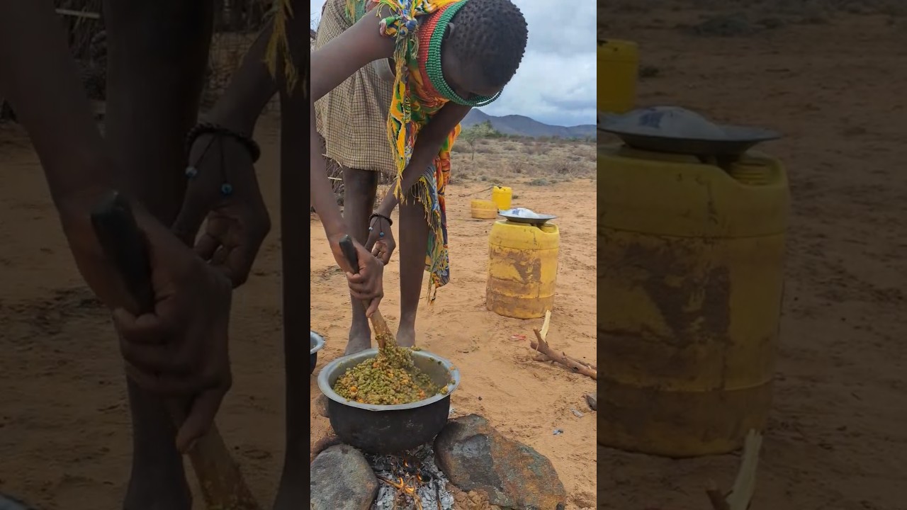 Turkana Tribe Young Woman Cooking Green Grams for her Kids in the Desert 