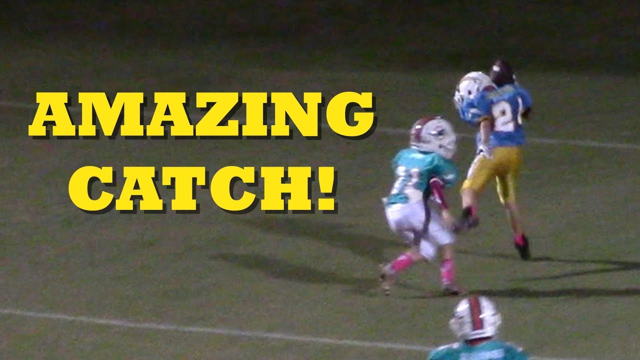 Amazing behindthehelmet touchdown catch in youth football YouTube