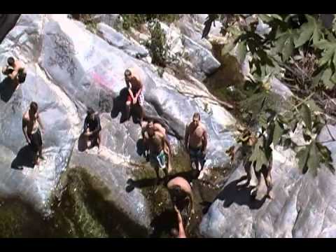 Patrick jumping off the big cliff at Hermit Falls in Arcadia