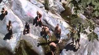 Patrick jumping off the big cliff at Hermit Falls in Arcadia