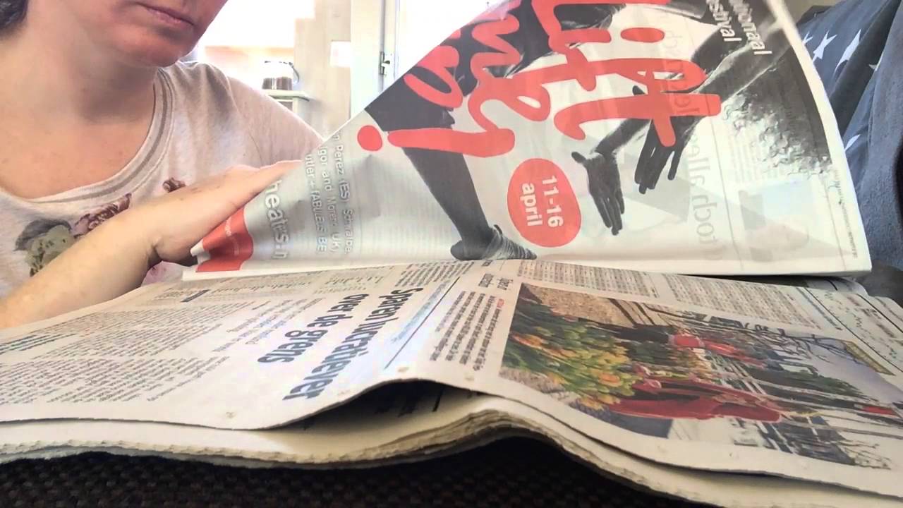 ASMR relaxing (slow) page turning newspaper with finger licking