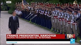 Macron inspects the Republican guard, under the sound of La Marseillaise and a 21-gun salute