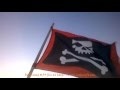 Flags flying sounds of victory on jolly roger  pirate background effect