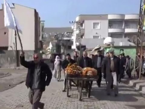 Turkish regime shooting Kurdish civilians waving white flag