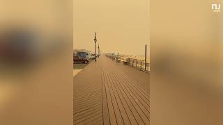 Canadian wildfires create orange glow in Belmar, N.J. on Wednesday June 7