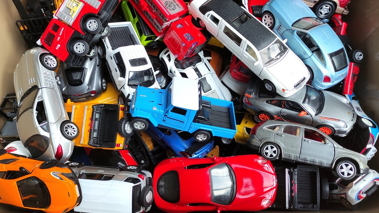 Box Full Of Diecast Cars Welly, Kinsmart, Maisto,  Newray and Let's Playing