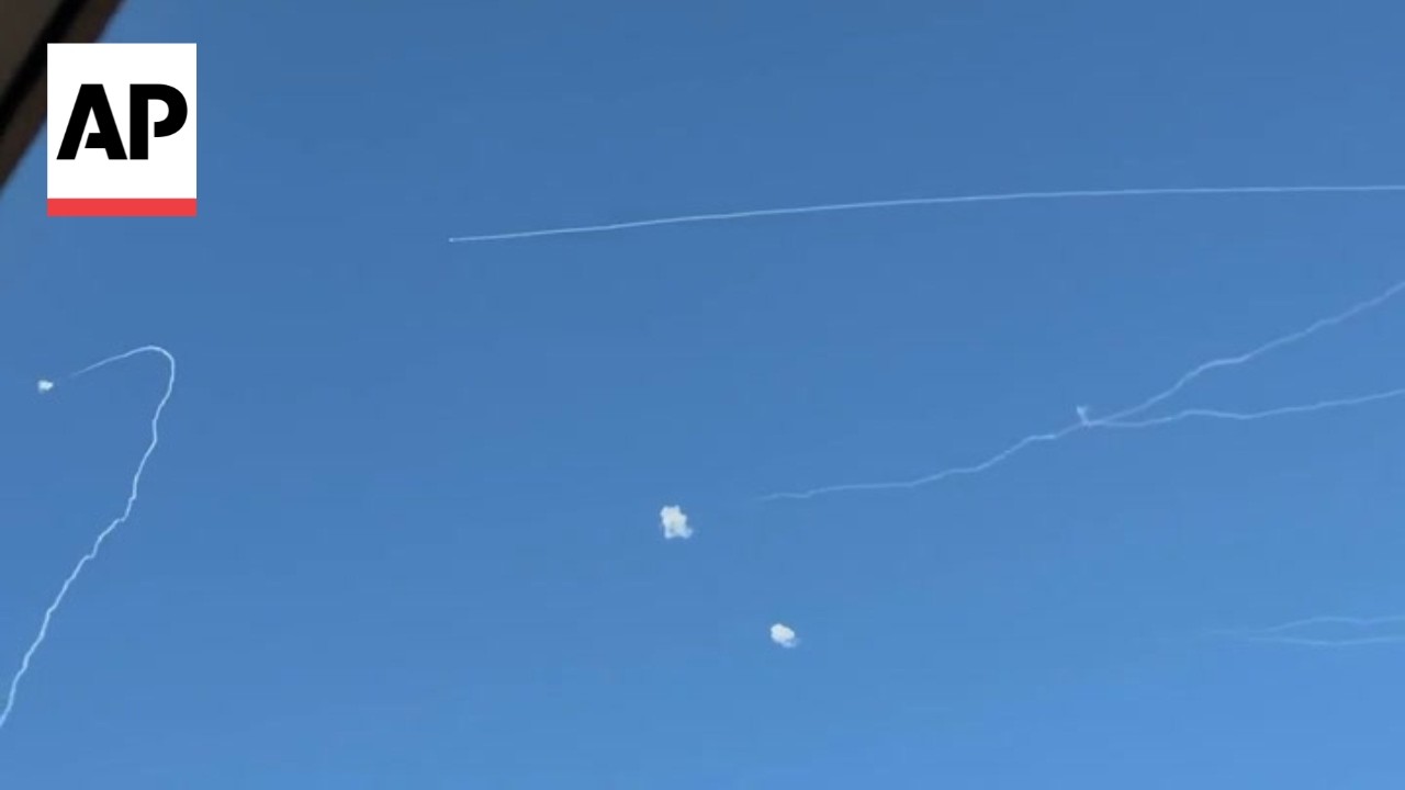 Tel Aviv residents run for cover as Israel intercepts missiles fired from Lebanon