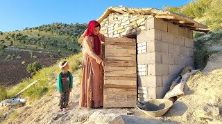 Nomadic life in the heart of the mountain: making a bathroom door using work boards