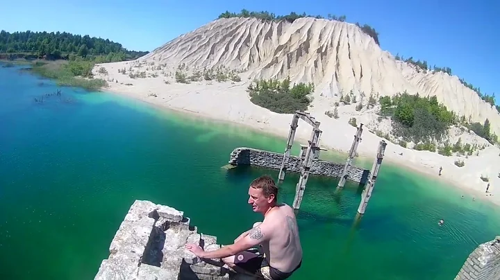 Jumping off a old Soviet Prison into rock Quarry R...