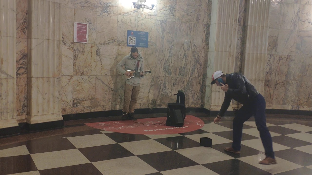 Russian balalaika performs in the Moscow metro