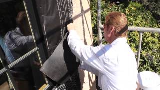 Install new stucco paper behind the existing paper to waterproof it.