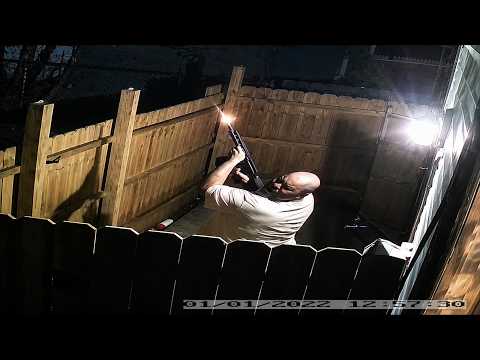 Man Celebrating New Year Has No Idea a Cop Is Behind the Fence