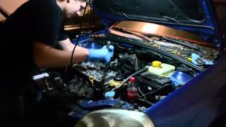 2006 Suzuki Forenza head gasket repair, bolting the head back on part 1