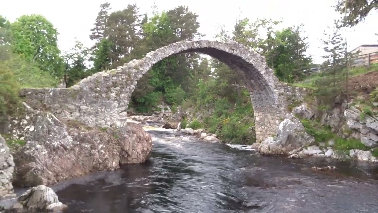 The famous historic 1719 built stone packhorse bridge at Carrbridge Highland Scotland