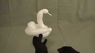 Learn how to make a balloon animal swan using balloon twisting
