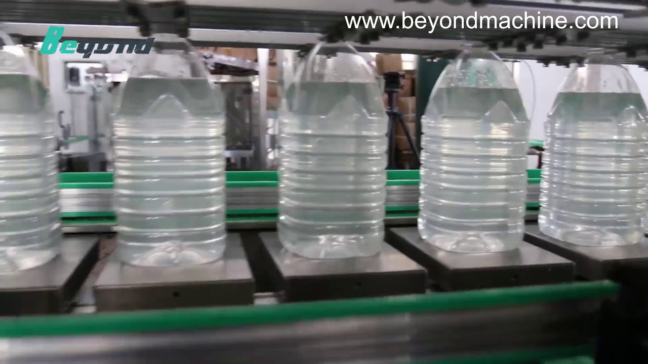 Oil filling machine weighting system