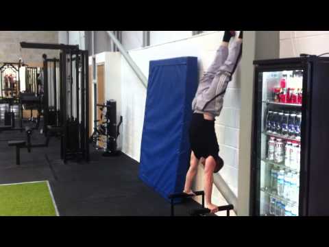 Warrington based gym Primal Strength and Conditioning  - David Miller handstand push ups