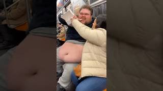 Man grabs food from lady