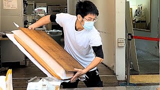 A shopkeeper swinging a giant Taiwanese castellaStreet Food