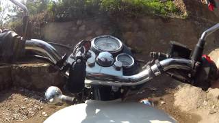 Royal Enfield crossing a bridge in Nepal