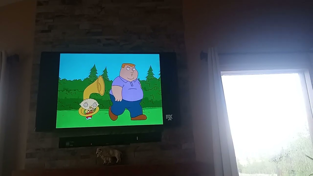 Family guy, Stewie following fat guy with tuba