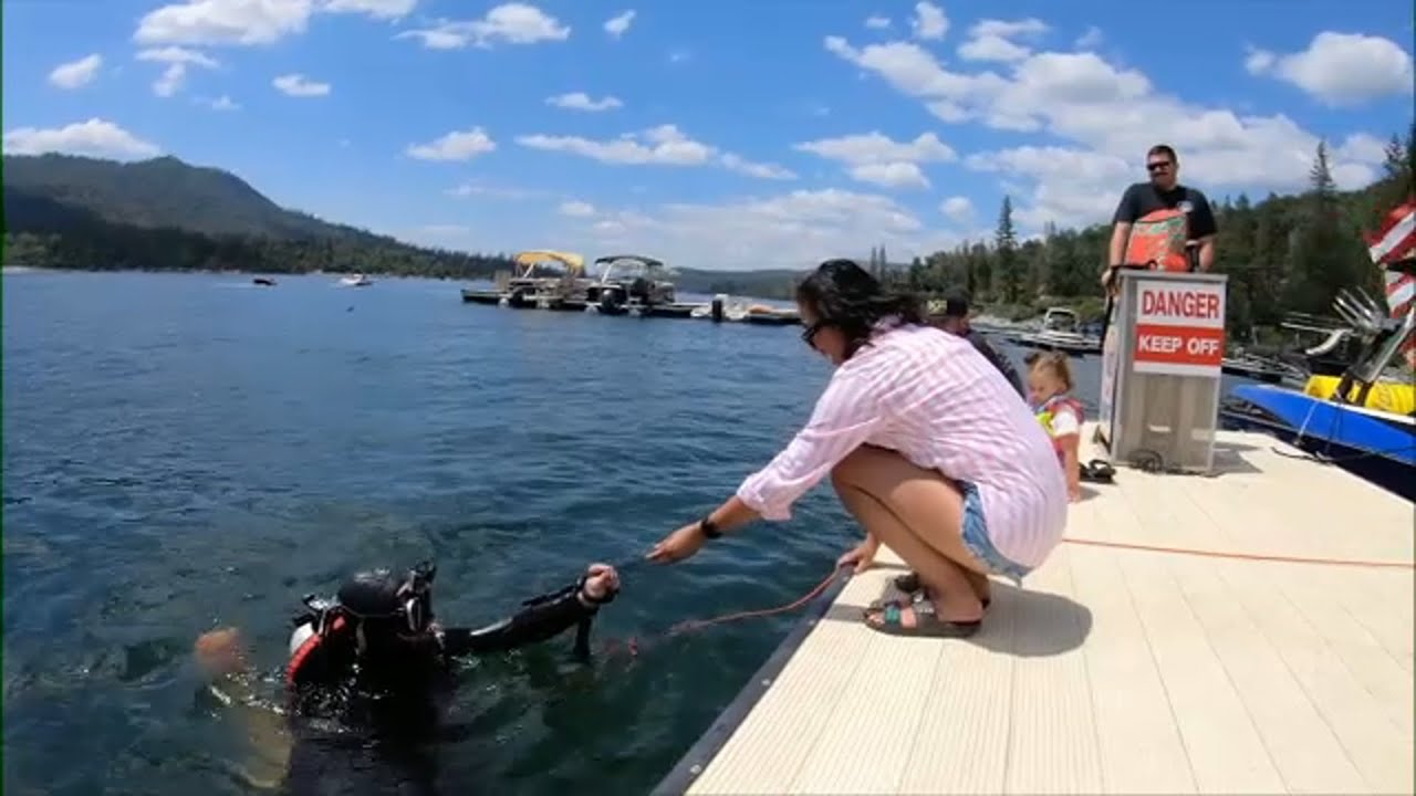 Diver finds woman's lost wedding ring at bottom of Bass Lake - YouTube