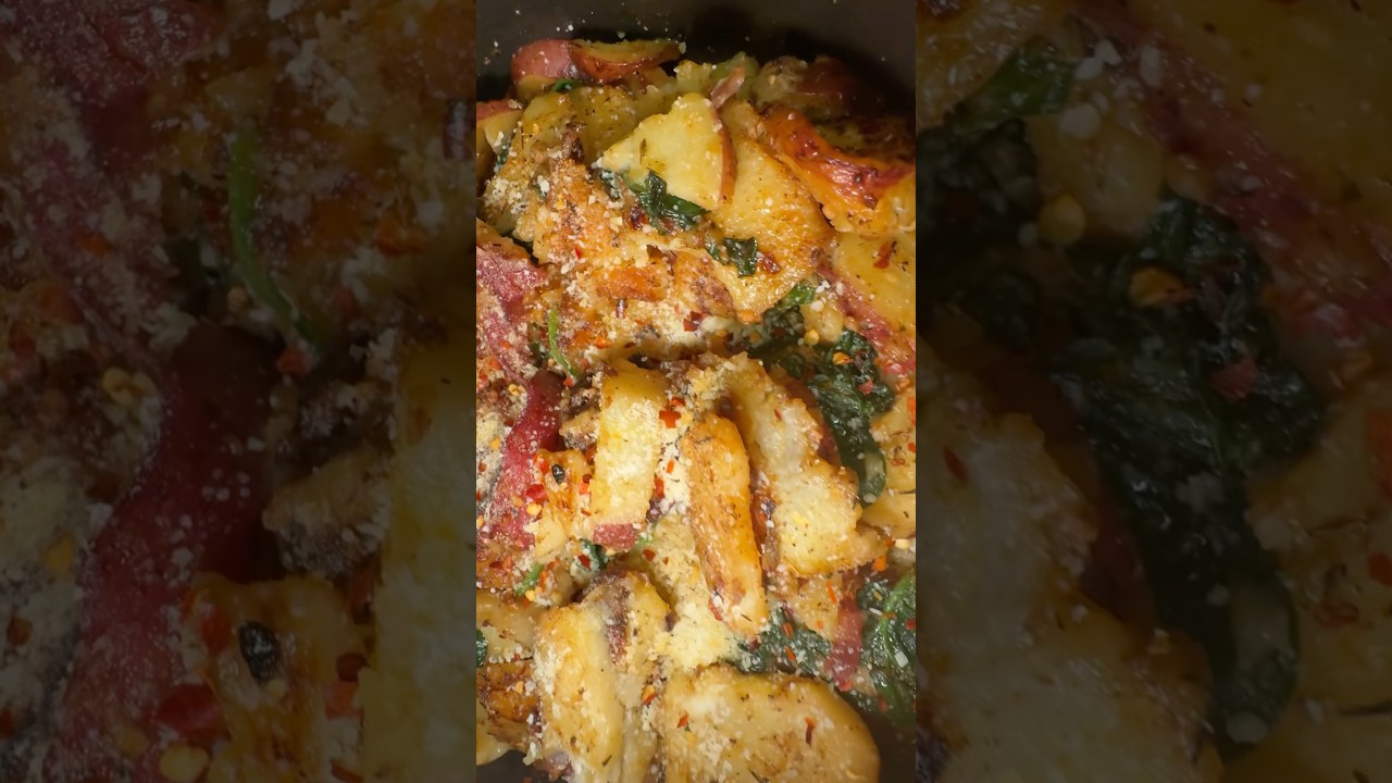 Pork chops and potatoes with spinach.