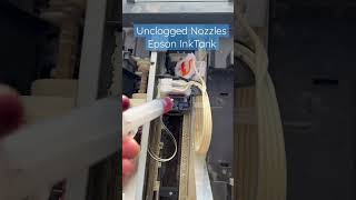 clean printhead and unclogged nozzles in epson ink tank printers