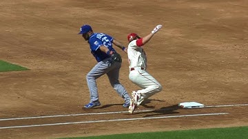 KC@STL: Reynolds slides into first to avoid the tag