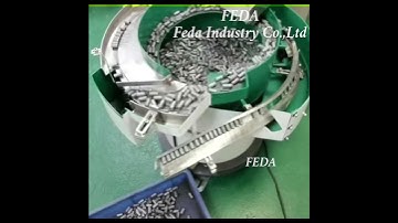 FEDA Automatic feeding vibrating bowl with storage hopper. #machine #auto #factory #metal