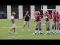 Nick Saban works with the Alabama DBs at Practice