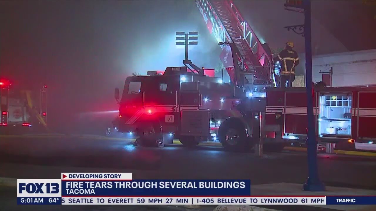Fire tears through several buildings - YouTube