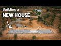 Building our house start to finish  episode 9 dug huge trench slab insulation plumbing and gravel