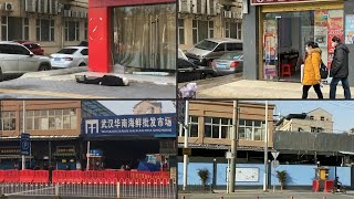 Then and now: Wuhan bustles one year after lockdown | AFP