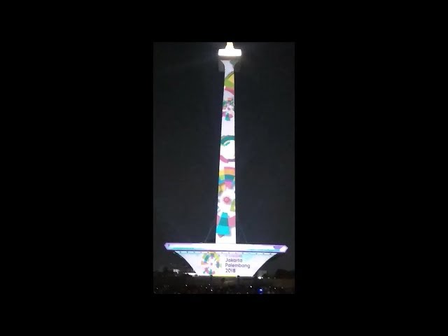 PERTUNJUKAN KEREN VIDEO MAPPING BERTEMA ASIAN GAMES 2018 DI TUGU MONAS JAKARTA class=