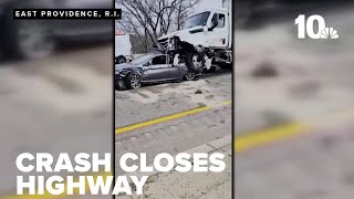 Tractor-trailer crashes into a dozen cars on Rhode Island highway