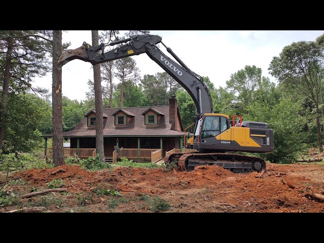 Using The Big Volvo 350 Excavator To Take Down The Massive Pines class=