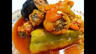 Stuffed Peppers in a Tomato Vegetable sauce. Looks good and tastes good!