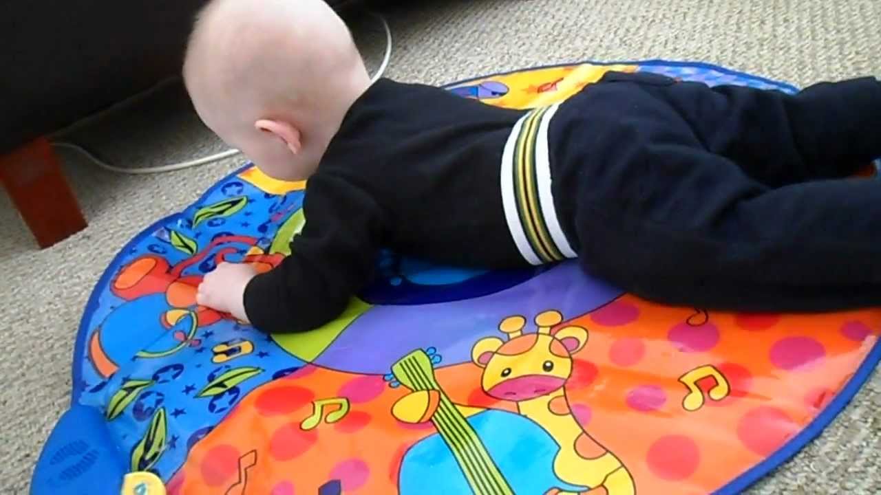 Baby Rolls Over On Musical Mat Youtube