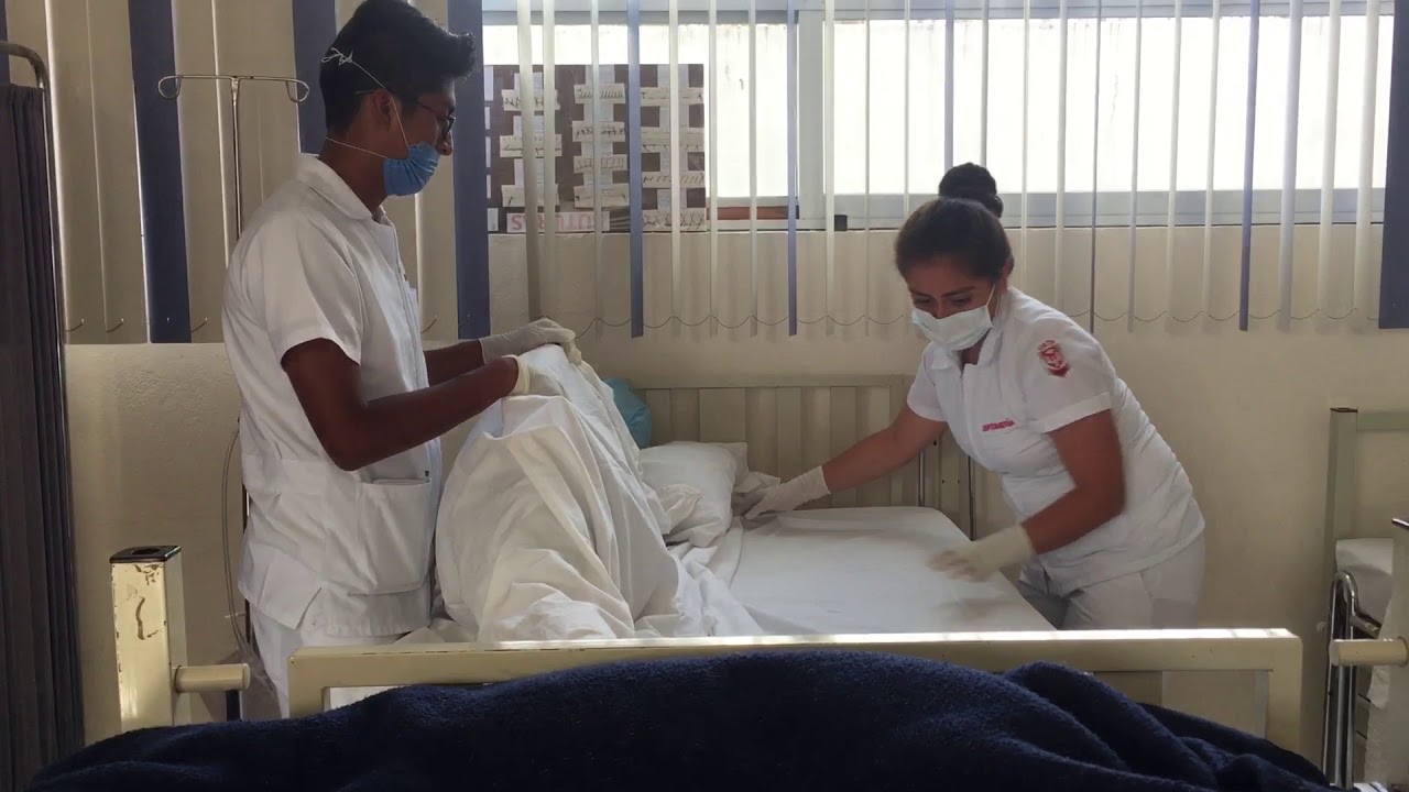 Tendido de cama con paciente - YouTube