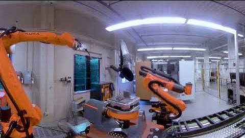 Virtual Reality Demonstration of a Hybrid Manufacturing Work Cell